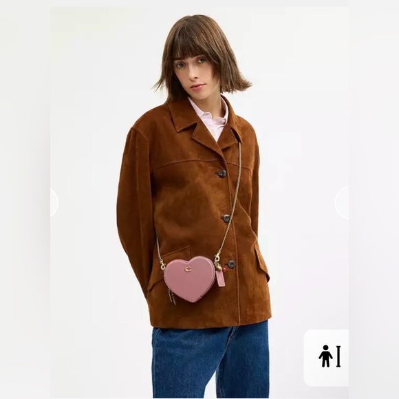 Coach Heart Crossbody Bag 14. Like new . The model is asame